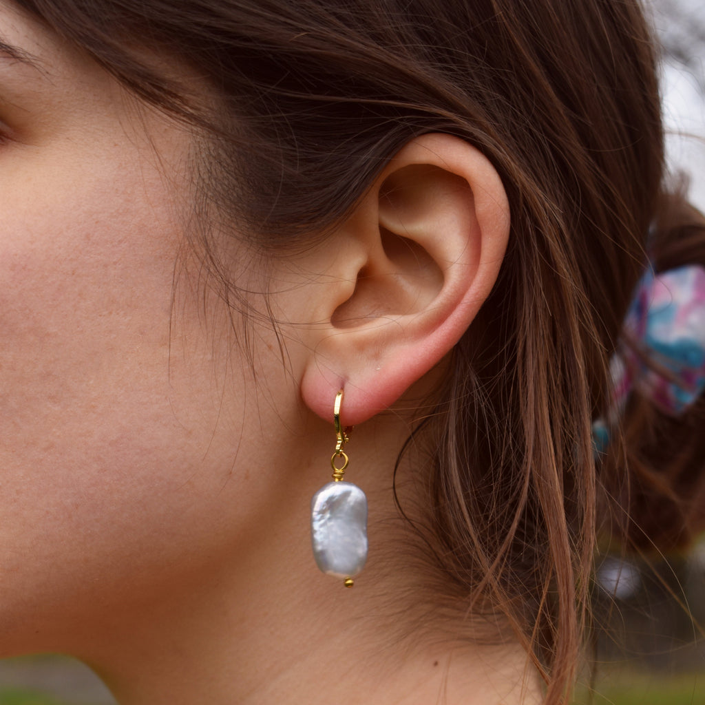 Silver freshwater pearl huggie hoop earrings | by Ifemi Jewels